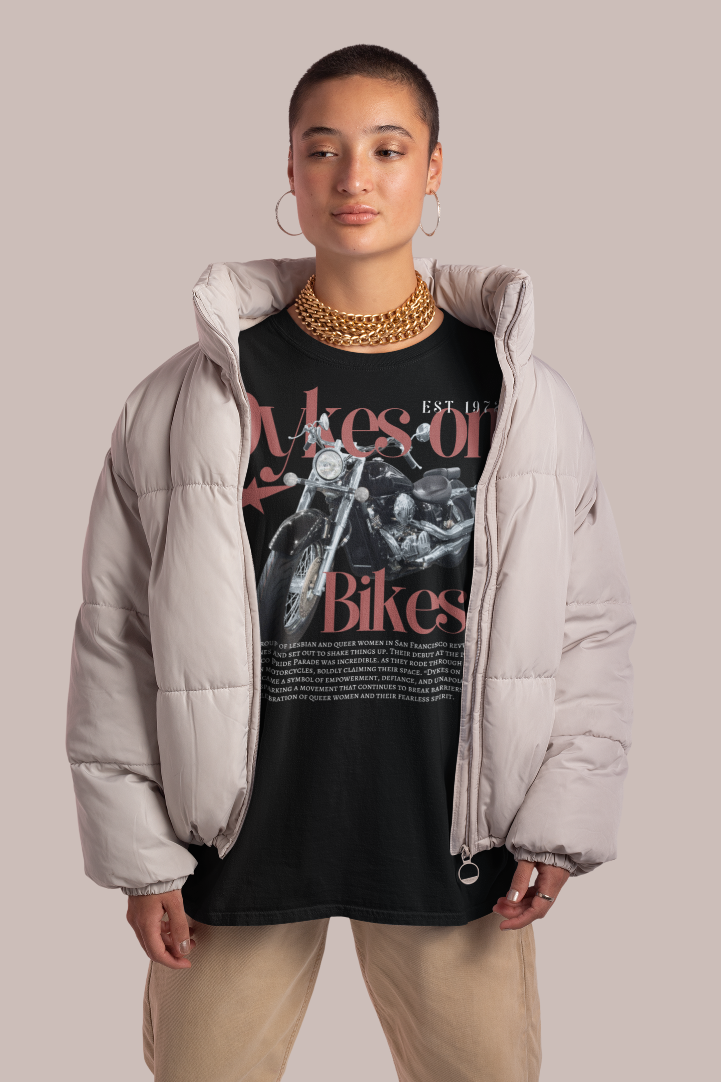Pride Clothing Smiling Black Man with Black T-Shirt that says Nature is Queer with Sketch graphics of queer animals and plants