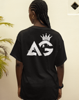 Camiseta AG agresiva para el estilo urbano Black Pride en color negro, camiseta de hombros caídos y de gran tamaño (190 g/m²)