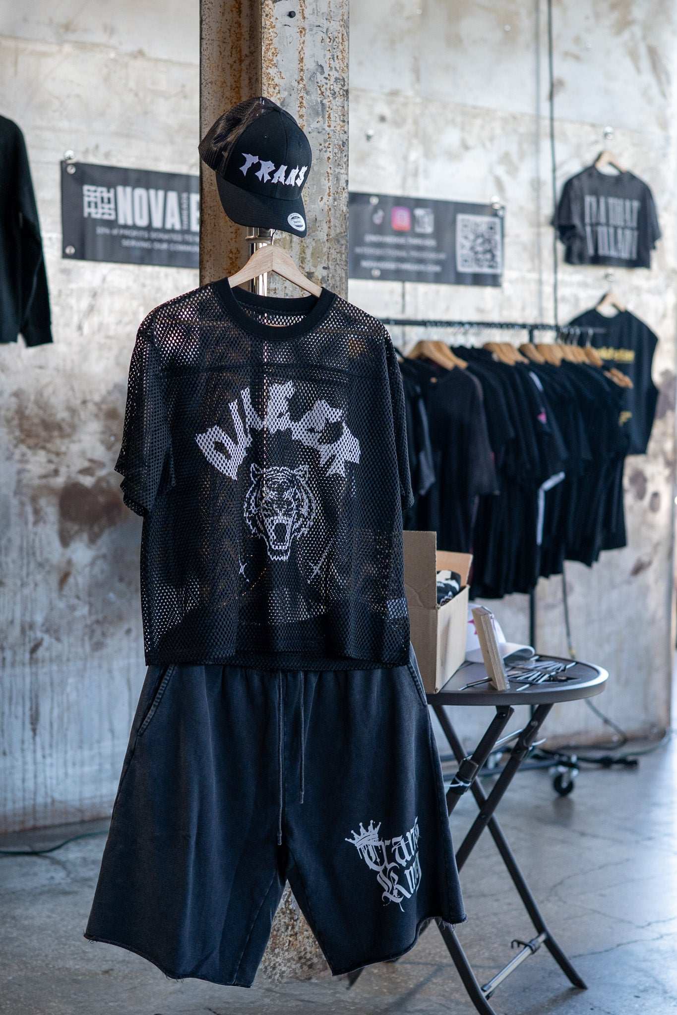Queer Pride Punk Tattoo Inspired Design on front of Black See-through Boxy Net T-shirt See-through Boxy Net T-Shirt