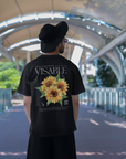 Sunflower Hidden Disabilities Pride Shirt on back of Black Oversize Deep Drop Shoulder Tee Oversize Deep Drop Shoulder Tee - 190 GSM