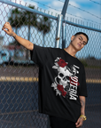 La Jotería Reclaimed Gay Pride Skull & Roses on front of Black Oversize Tee Oversize Deep Drop Shoulder Tee - 190 GSM