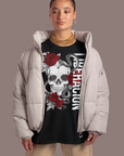 La Jotería Reclaimed for Pride and Resistance Latino Streetwear on front of Black Oversize Deep Drop Shoulder Tee - 190 GSM