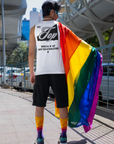 NYC Top Tank Book your Reservations Gay Pride on back of Relaxed Fit Sleeveless Tank Top Relaxed Fit T-Shirt