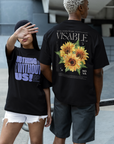 Sunflower Hidden Disabilities Pride on back of Size Inclusive Black Relaxed Fit T-shirt Oversize Deep Drop Shoulder Tee - 190 GSM