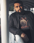 The Bear Brotherhood Gay Pride T-Shirt on front of Black Oversize Deep Drop Shoulder Tee