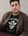 Trans Cowboy Vintage Graphic Tee Transmasc Pride on front of Black Acid Wash Oversize T-Shirt - 250 GSM Acid Wash Oversize T-Shirt
