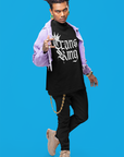 Camiseta gráfica Trans King con corona y gotas de pintura en aerosol sobre hombros caídos de gran tamaño en negro - 190 g/m²