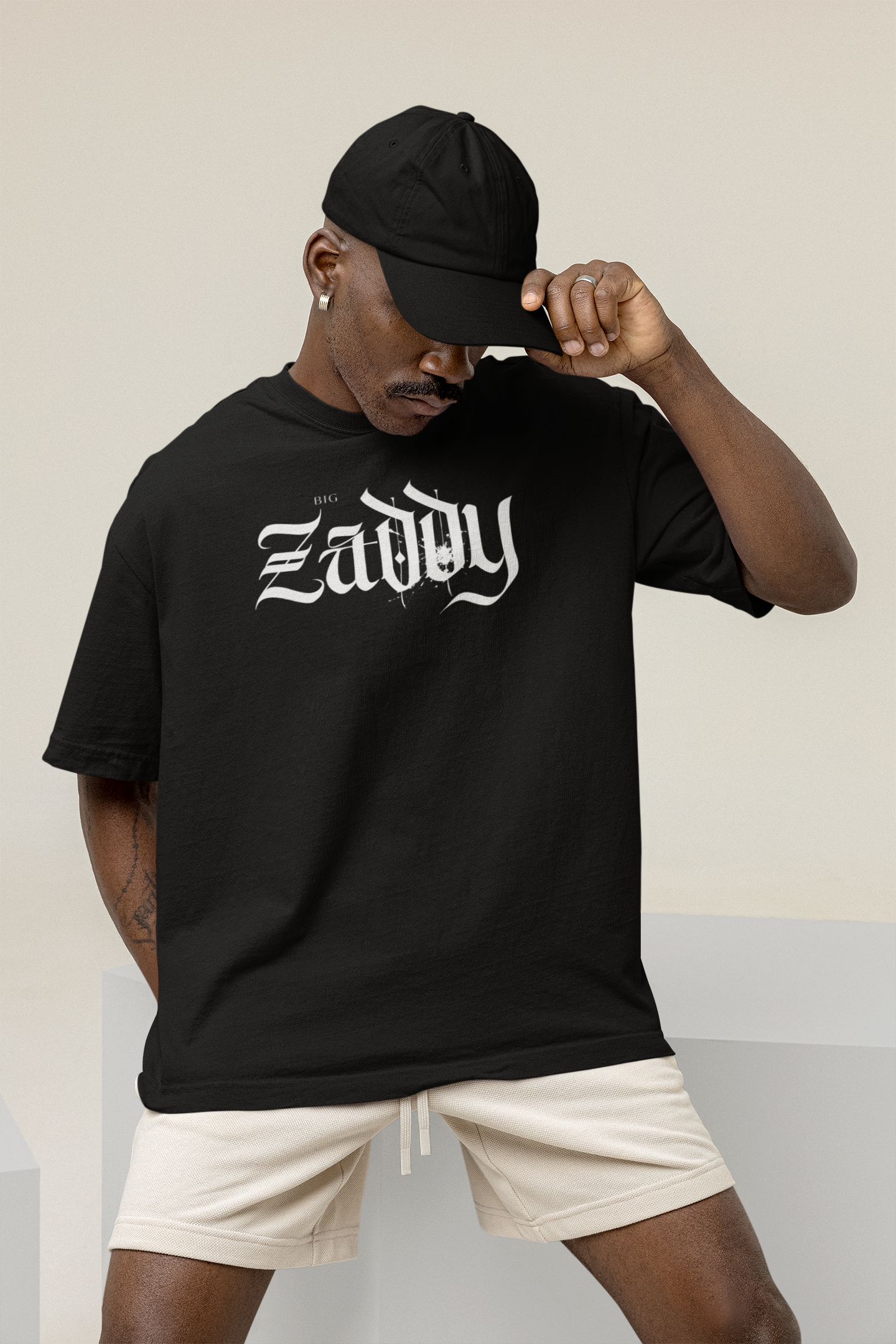 Big Zaddy Graphic Tee Streetwear Style on front of Black Oversize Deep Drop Shoulder Tee - 190 GSM Oversize Deep Drop Shoulder Tee - 190 GSM