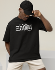 Big Zaddy Graphic Tee Streetwear Style on front of Black Oversize Deep Drop Shoulder Tee - 190 GSM Oversize Deep Drop Shoulder Tee - 190 GSM