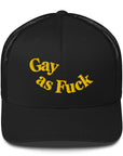Gay as Fuck embroidered in gold yellow onto a black vintage style trucker hat