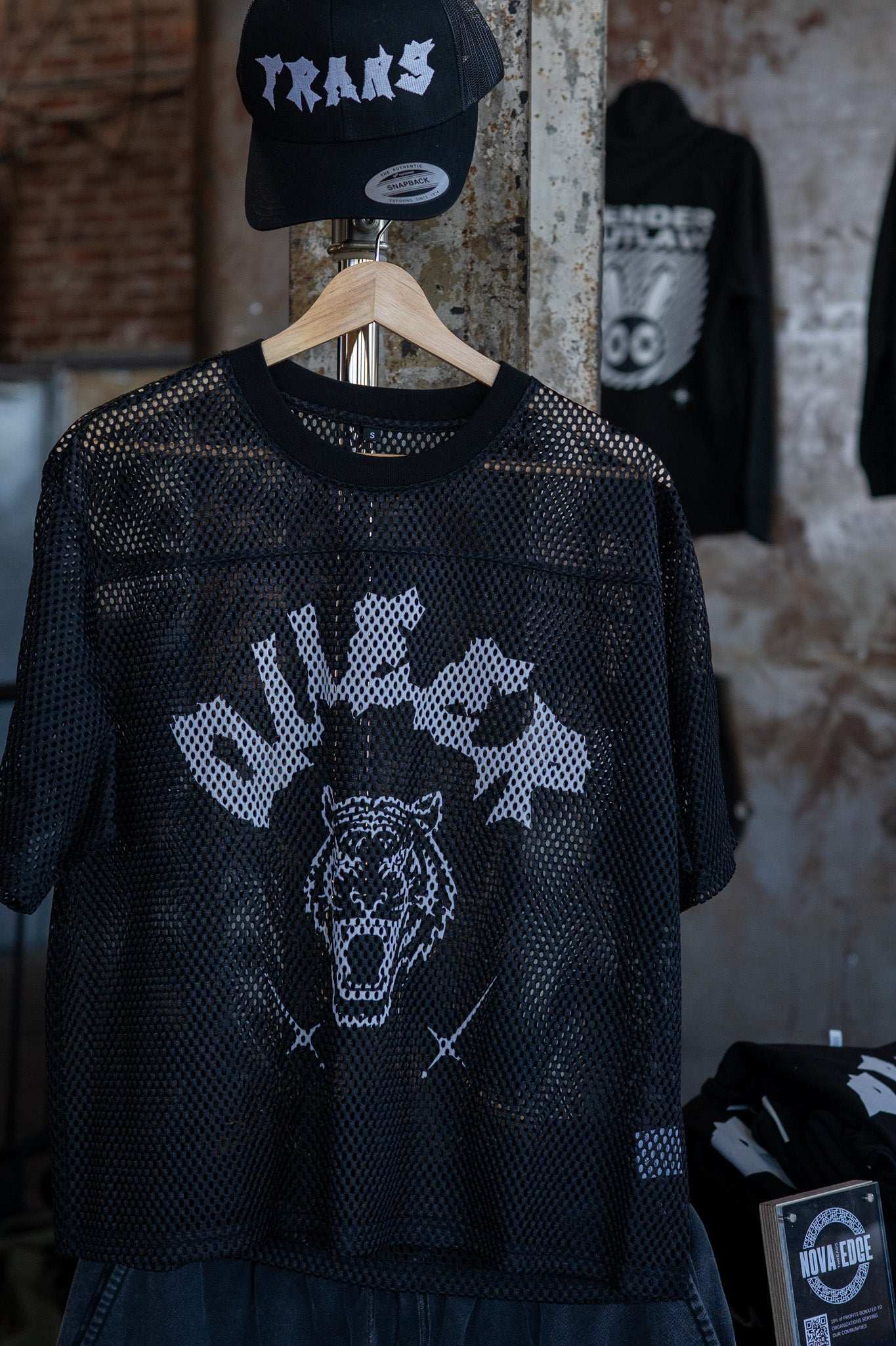 Queer Pride Punk Tattoo Inspired Design on front of Black See-through Boxy Net T-shirt See-through Boxy Net T-Shirt