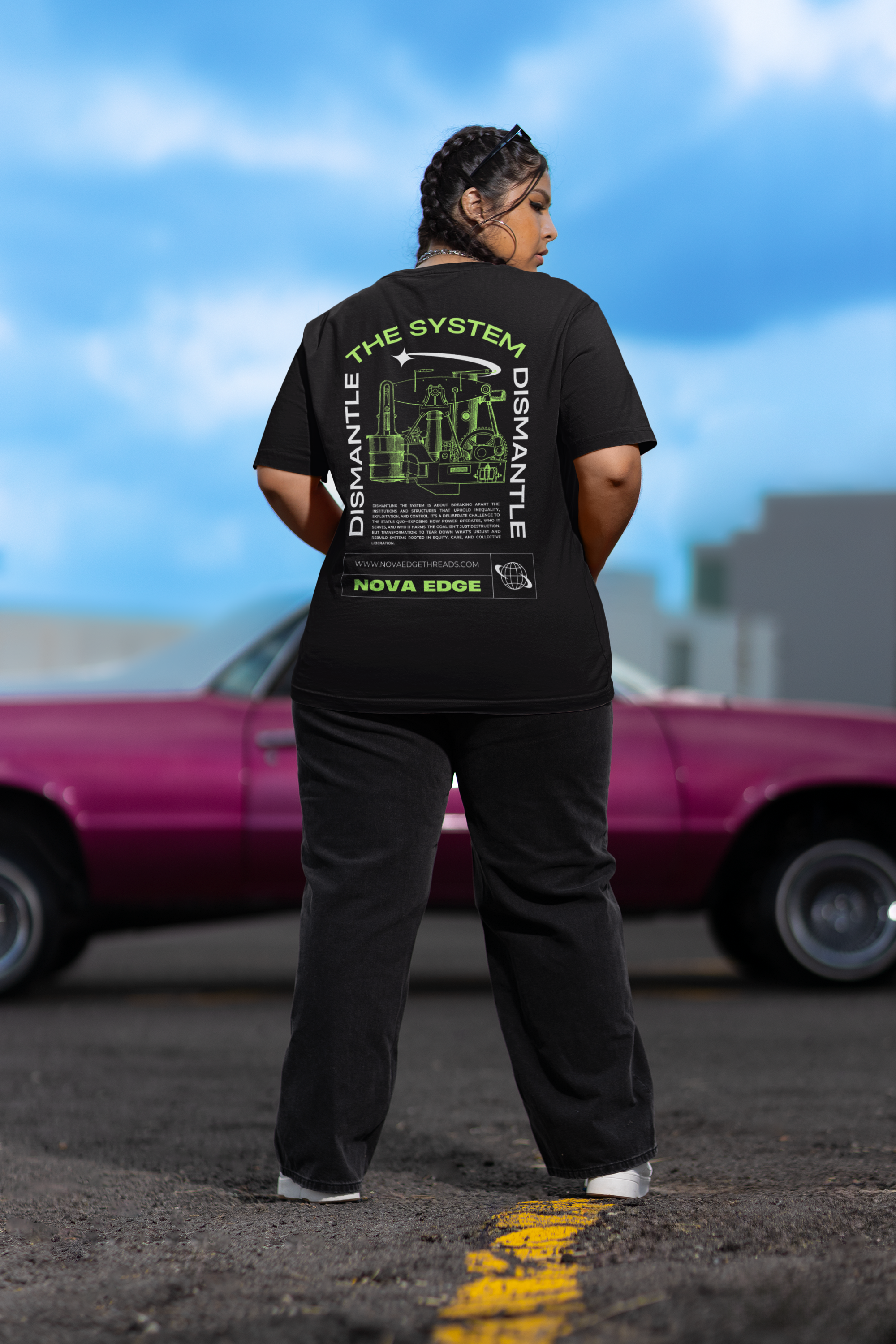 Dismantle the System Graphic T-Shirt Protest on back of Black Oversize Deep Drop Shoulder Tee
