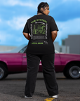 Dismantle the System Graphic T-Shirt Protest on back of Black Oversize Deep Drop Shoulder Tee