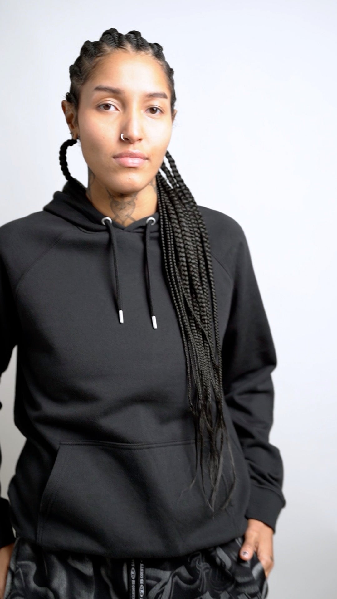 Top Challenger Non Binary Division Undefeatable on back of Black Eco Raglan Hoodie