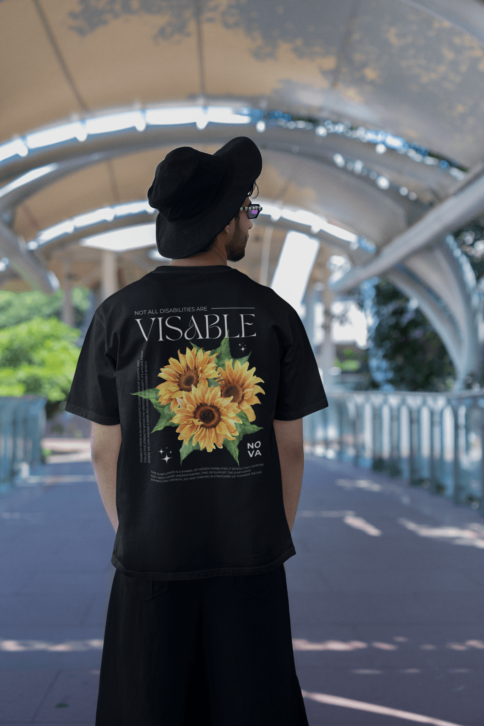 Sunflower Hidden Disabilities Pride Shirt on back of Black Oversize Deep Drop Shoulder Tee Oversize Deep Drop Shoulder Tee - 190 GSM
