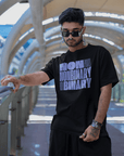 Non Binary Pride Shirt Lavender Word Block Art front of Black Size Inclusive Oversize Tee Size Inclusive Oversize Tee