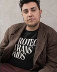 Protect Trans Kids Cream Text on Black Oversize Deep Drop Shoulder Tee