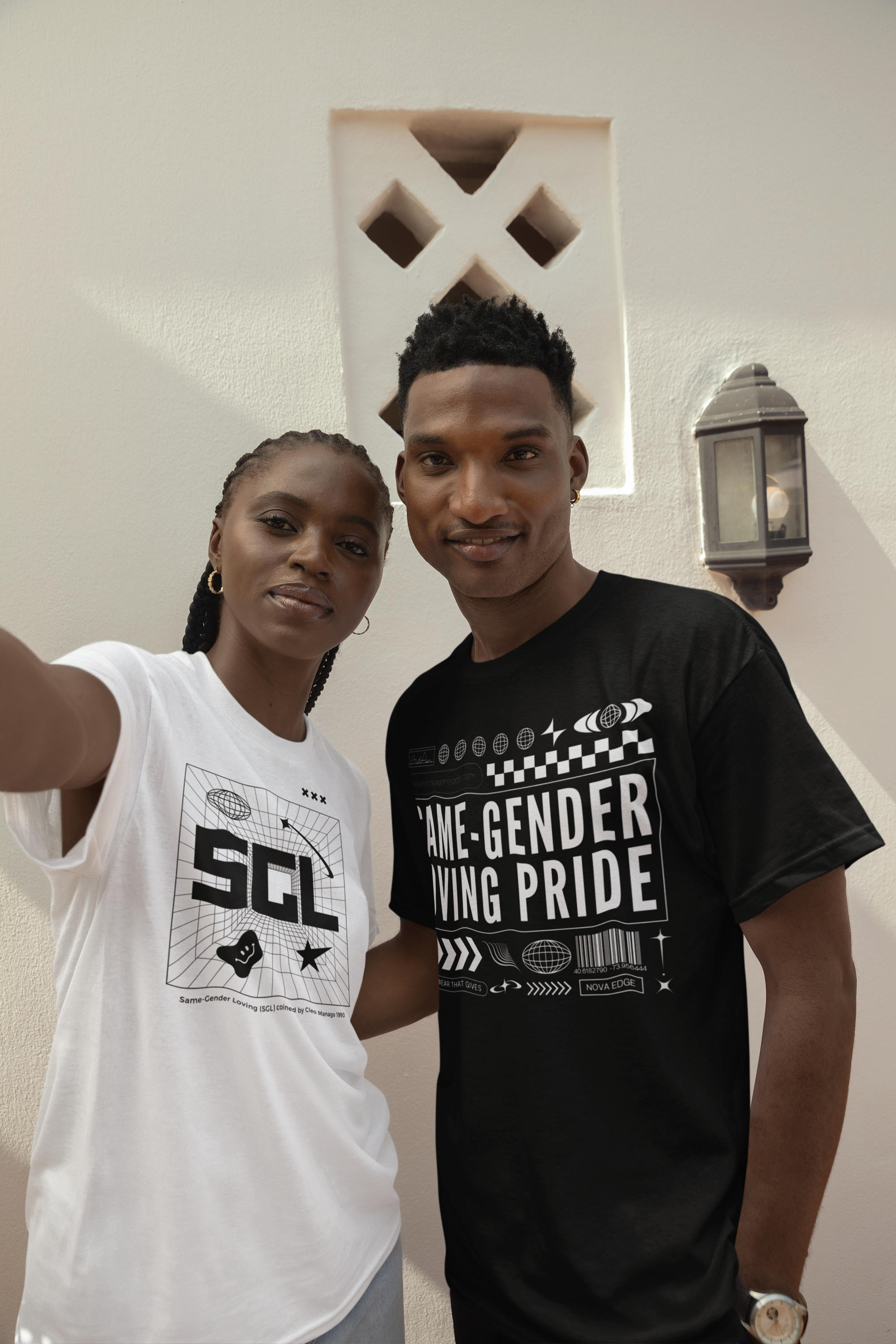 Two people taking a selfie with Graphic T-Shirts in Streetwear Style One says SGL with Y2k vibes and the other says Same-Gender Loving Pride