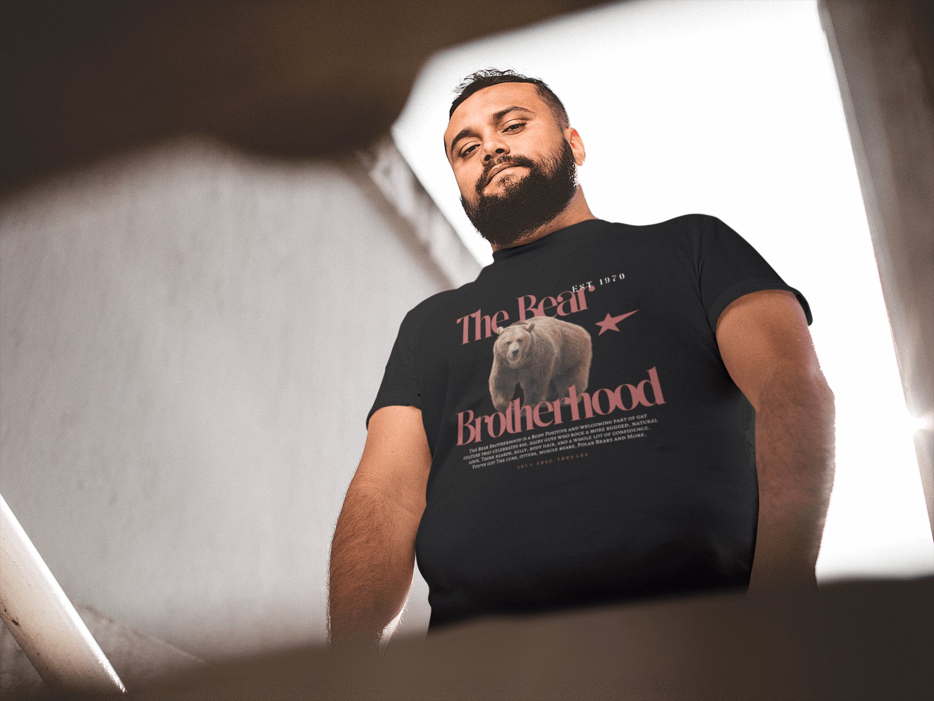 The Bear Brotherhood Gay Pride T-Shirt on front of Black Oversize Deep Drop Shoulder Tee