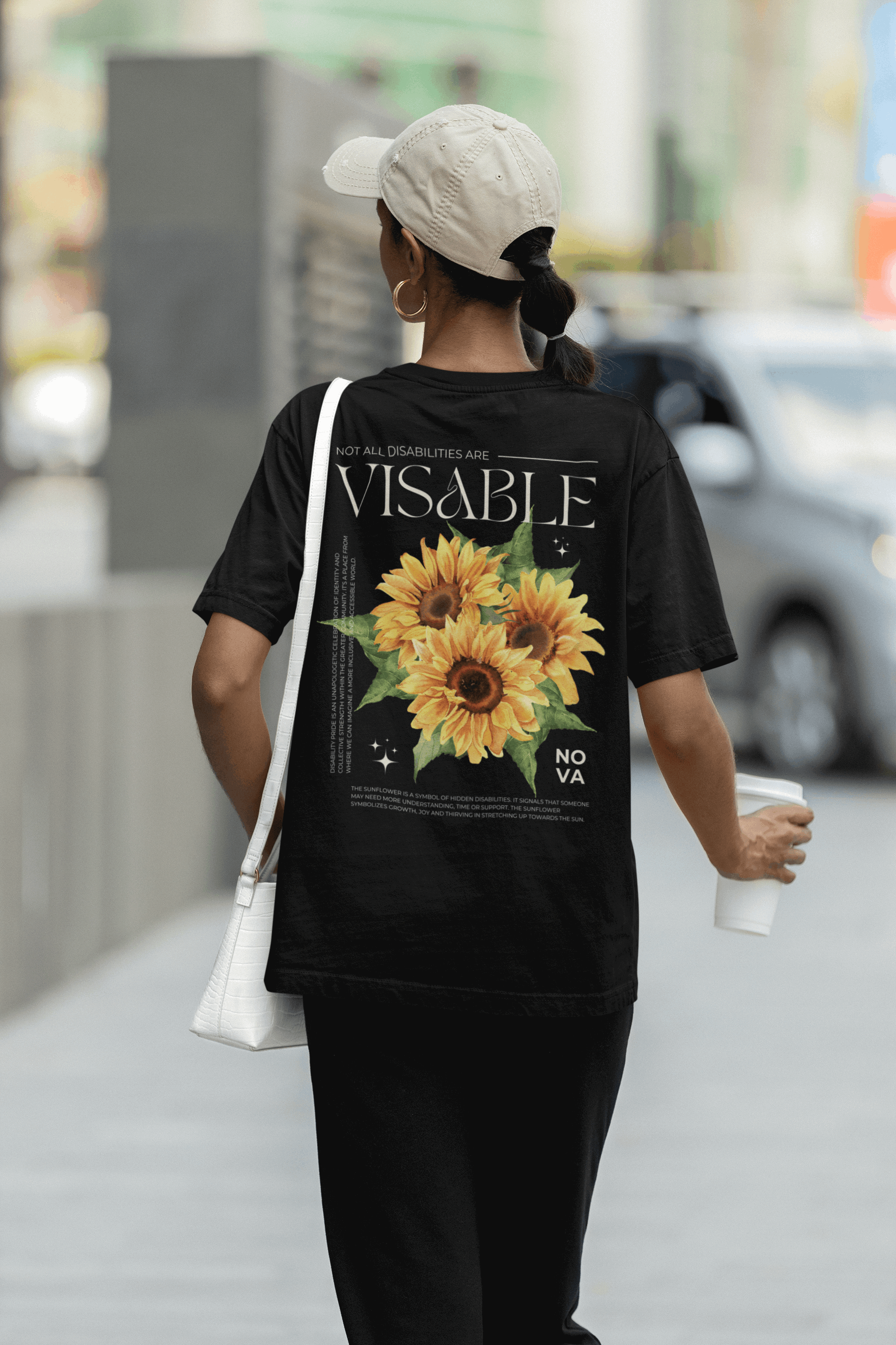 Sunflower Hidden Disabilities Pride Shirt on back of Black Oversize Deep Drop Shoulder Tee Oversize Deep Drop Shoulder Tee - 190 GSM