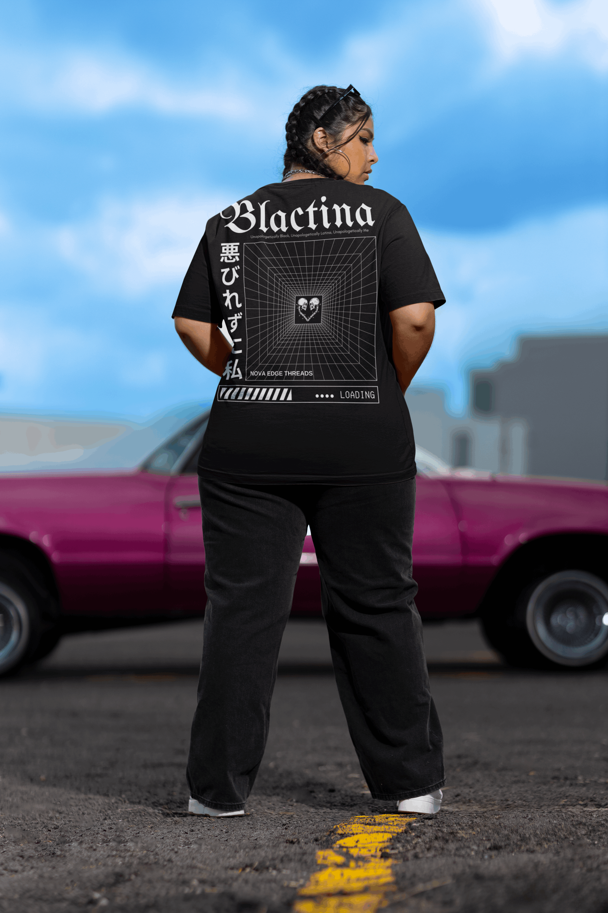 Blactina Graphic T-Shirt Black and Latina Pride on back of Black Oversize Deep Drop Shoulder Tee
