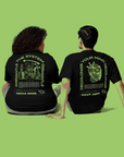 Dismantle the System Graphic Tee Neon Green on back of Black Size Inclusive Oversize Tee Size Inclusive Oversize Tee