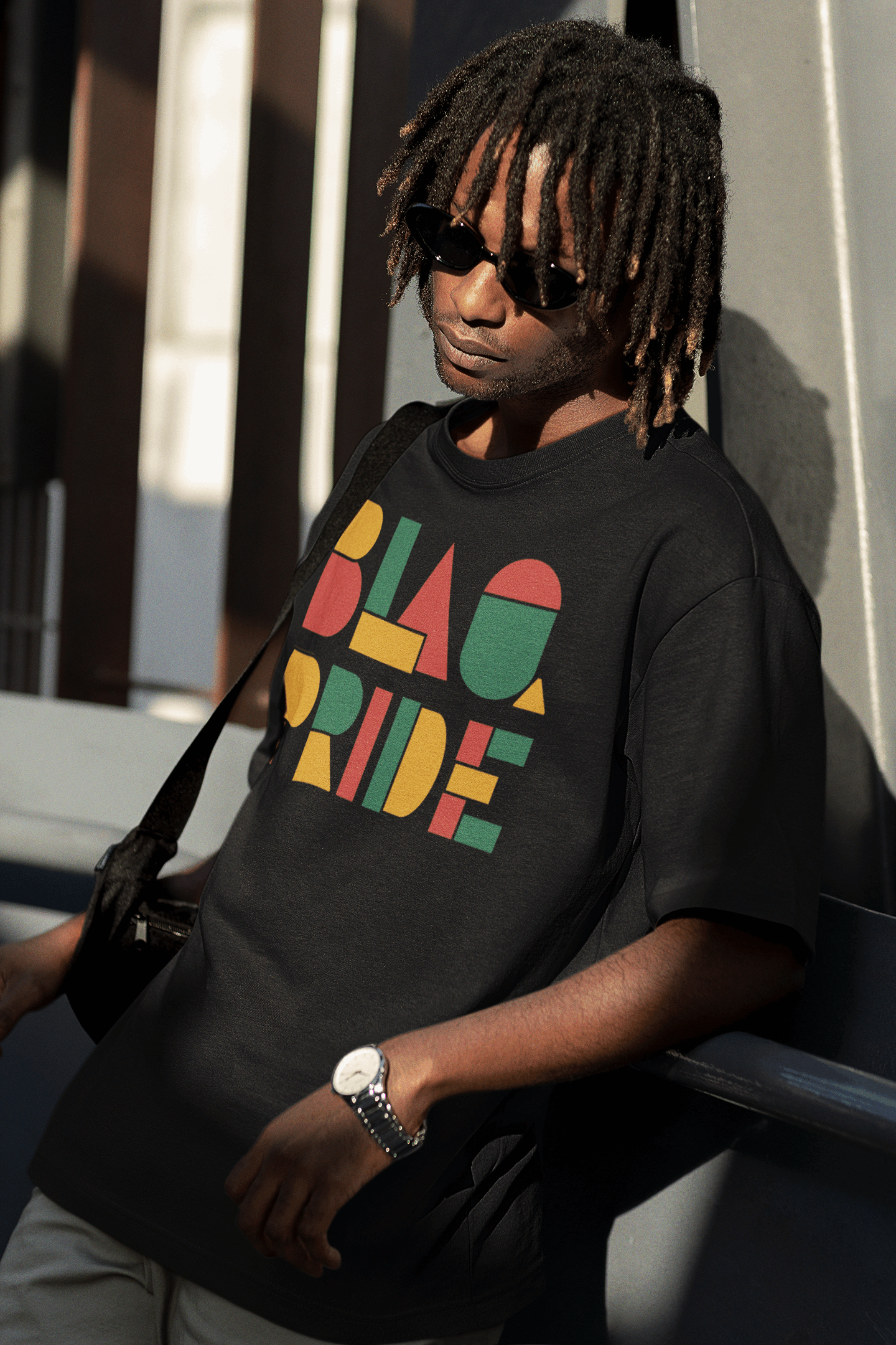 BlaQ Pride Geometric Lettering Red Yellow Green on Black Oversize Deep Drop Shoulder Tee