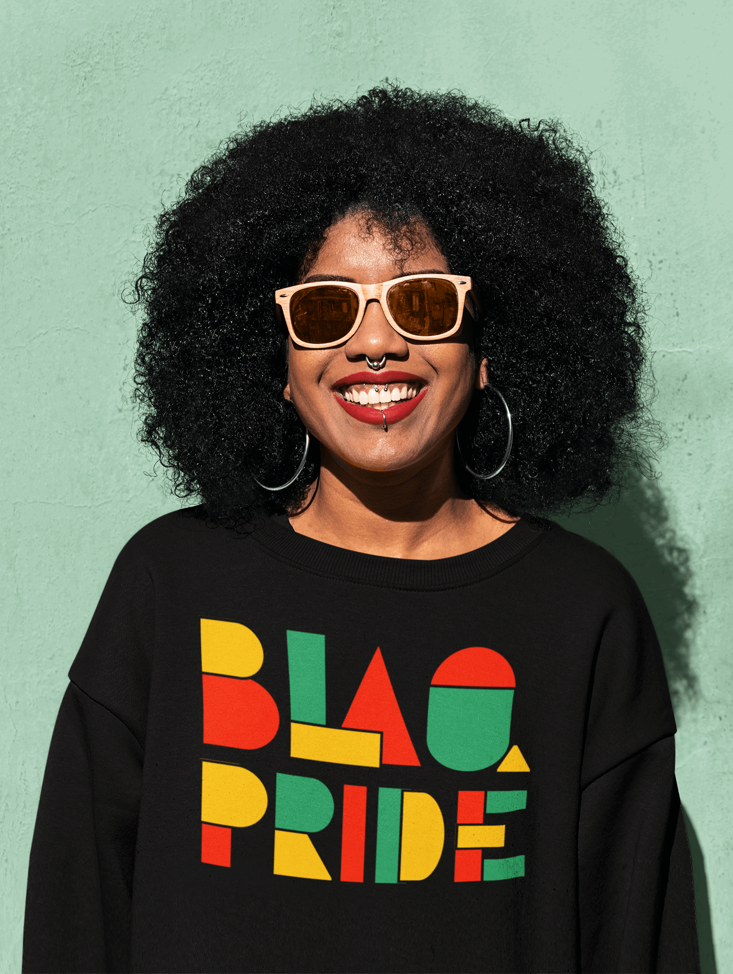 BlaQ Pride Geometric Design Iconic African Culture Colors on Black Organic Cotton Raglan Sweatshirt